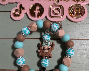 Ready to Ship Beaded Bangle turquoise/tan/ brown cow print wristlets.  Dangle cow charm keychain/ turquoise cow print wristlet keychain