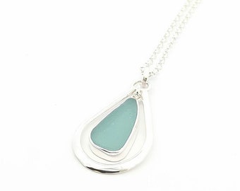 Sea glass necklace handmade in 925 sterling silver. A Maine gift for her. Simple modern jewelry using sea glass tumbled by beach waves.