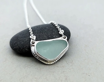 Sea glass jewelry. Handmade sea glass necklace in Sterling Silver. Bezel wrapped sea glass. Made in Maine. Genuine sea glass pendant.