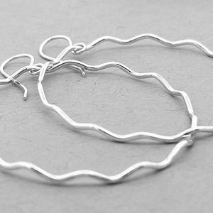 Handmade sterling silver earrings. Hammered silver hoop earrings are the perfect gift for her Hoop earrings Lightweight silver hoop earrings