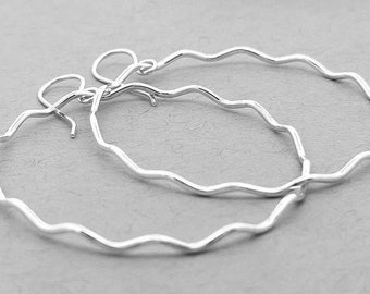 Handmade sterling silver earrings. Hammered silver hoop earrings are the perfect gift for her Hoop earrings Lightweight silver hoop earrings