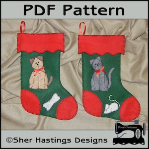 Peut inclure: Patron PDF pour deux chaussettes de Noël en feutre. Une chaussette représente un chien avec un os, l'autre un chat avec une souris. Les deux chaussettes sont vertes avec des revers rouges et des accents blancs.