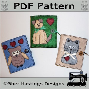 May include: PDF pattern for felt crafts featuring three different designs: an owl, a dog, and a cat. Each design includes a heart and a button. The pattern is by Sher Hastings Designs.