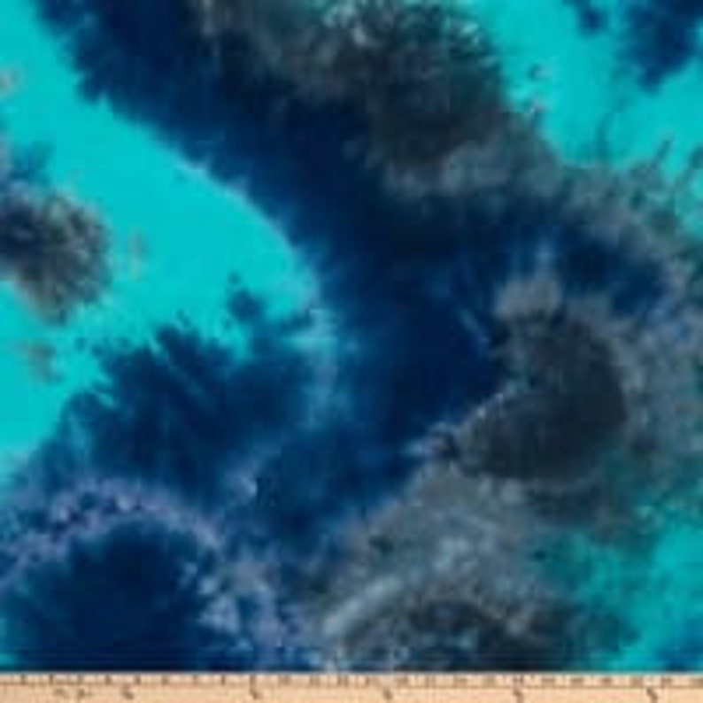 May include: Abstract tie-dye fabric in shades of teal, blue, and gray. The fabric has a swirling, marbled pattern.
