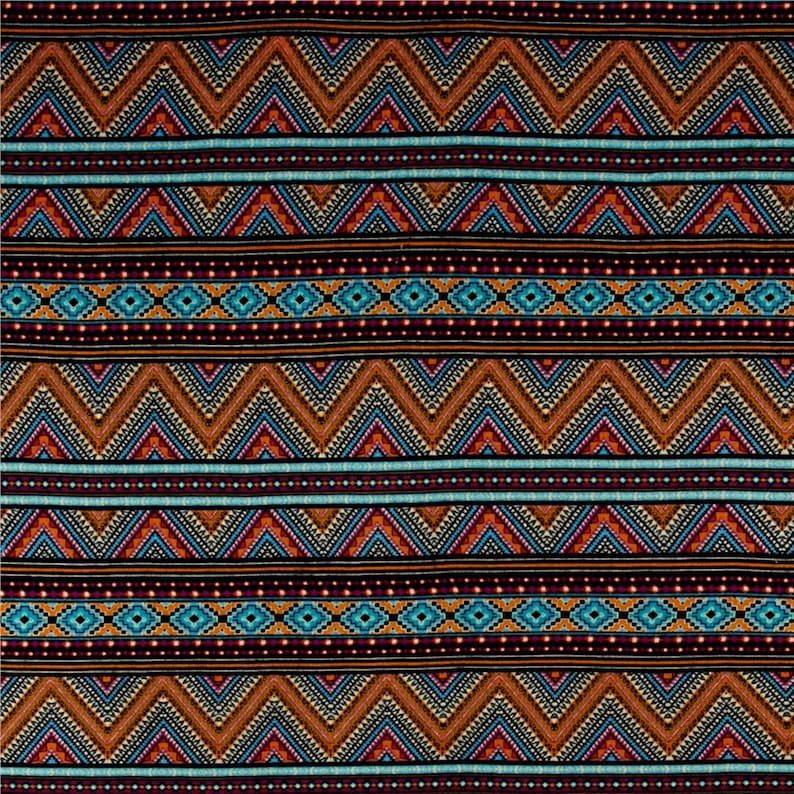 May include: A black fabric with a repeating pattern of brown, orange, blue, and red geometric shapes. The pattern is made up of zigzags, diamonds, and dots.