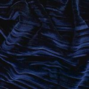 May include: Close-up of a dark blue velvet fabric with a wavy, textured pattern.