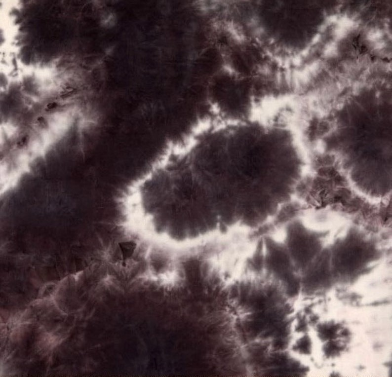 May include: Abstract tie-dye pattern in shades of black and white. The pattern resembles clouds or smoke.