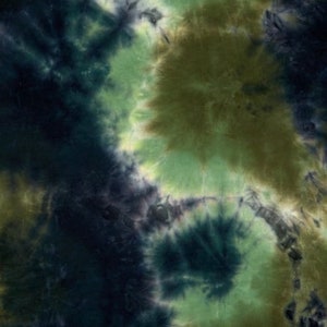 May include: Abstract tie-dye pattern in shades of green, blue, and brown. The fabric has a swirling, marbled effect.