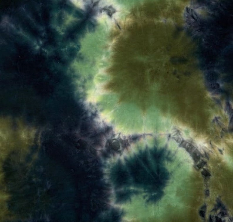 May include: Abstract tie-dye pattern in shades of green, blue, and brown. The fabric has a swirling, marbled effect.