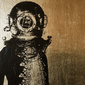 May include: A black and white silhouette of a diver wearing a vintage diving helmet against a gold background.