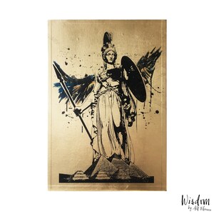 May include: A black and white illustration of a woman wearing a helmet and holding a spear and shield. The background is gold with black splatters of paint. The image is titled "Wisdom by Ali Hernandez".