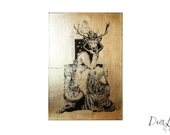 May include: A gold-toned canvas print featuring a black and white illustration of a deer-headed woman sitting on a throne with a tiger and an owl at her feet. The artwork is titled "Deer Lady" by AM Florence.