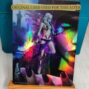 1x Foil Altered Art Alela, Cunning Conqueror (Non foil into Foil)
