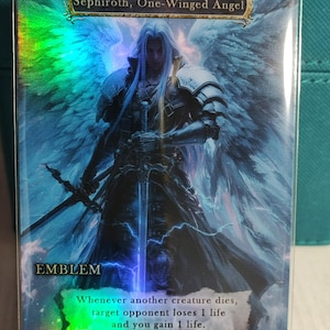 1x *LAMINADO CON LÁMINA* Emblema de Sephiroth personalizado y alterado