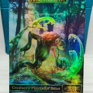 1x Bestia Phyrexiana n. 1 *LAMINATO IN FOGLIO* Gettone modificato personalizzato
