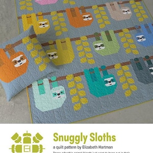 May include: A light blue quilt and pillow set featuring a repeating pattern of colorful sloths hanging from brown branches. The sloths are in various colors, including pink, orange, yellow, and teal. The quilt and pillow have a leaf pattern.