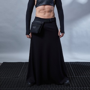 Man in black SK-L skirt with cropped harness top – dark avant-garde cosplay