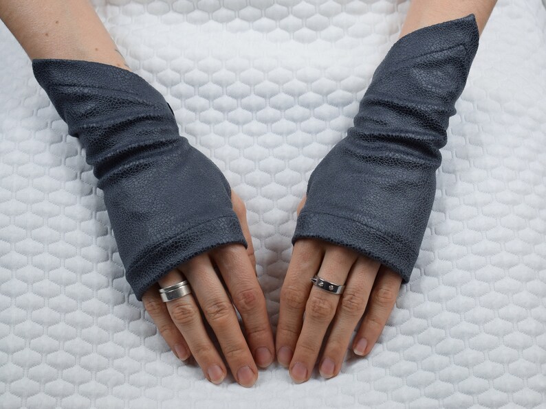Grey faux leather fingerless gloves on both hands, unisex arm warmers