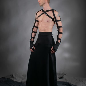 Man in black SK-L floor-length skirt with harness, front view – cyberpunk