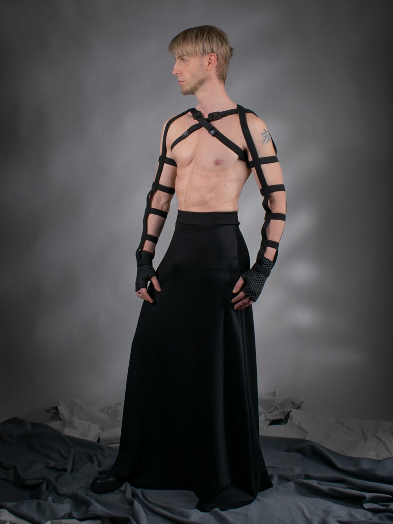 Man in black SK-L floor-length skirt with harness, front view – cyberpunk