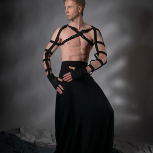 Man in black SK-L high waist skirt with harness, front view – stage wear
