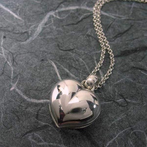 Silver Puffy Heart 4 Pictures Locket