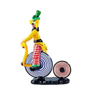 Sculpture de clown en verre de Murano : figurine vénitienne à vélo