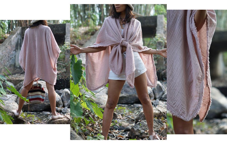 May include: A pink cotton gauze kimono with a frayed edge. The kimono is tied at the waist and worn over white shorts.