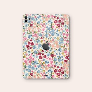 an ipad case with a flower pattern on it