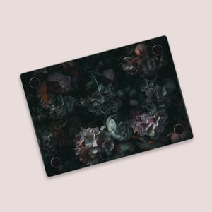 a picture of a bunch of flowers on a cutting board