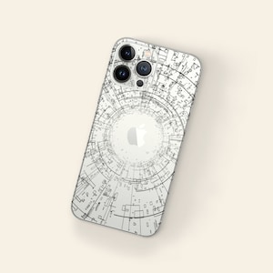 Könnte beinhalten: Weiße iPhone-Hülle mit einem geometrischen Design in Schwarz und Weiß. Das Design zeigt einen Kreis in der Mitte mit einem weißen Apple-Logo.
