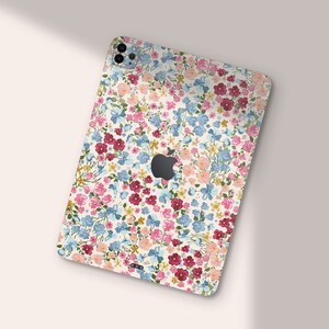 an ipad case with a flower pattern on it