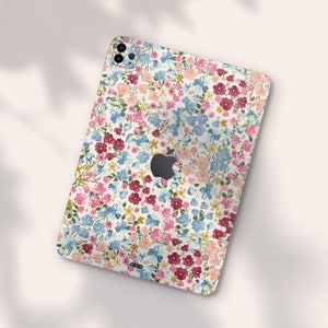 an ipad case with a flower pattern on it