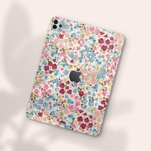 an ipad case with a flower pattern on it