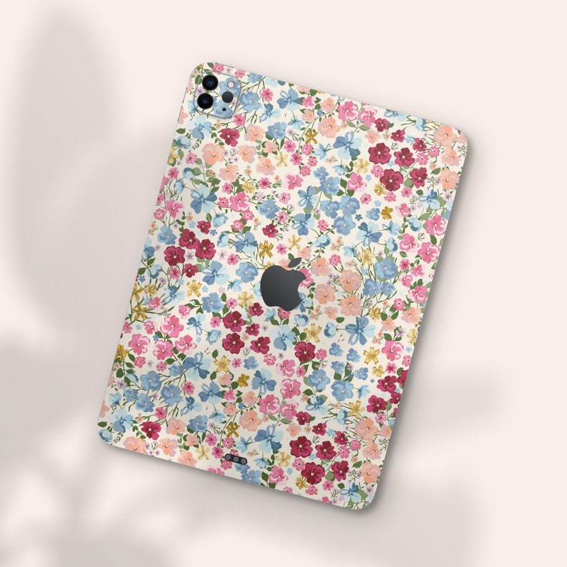 an ipad case with a flower pattern on it