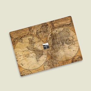 May include: A vintage world map design laptop skin with a faded brown and cream color scheme. The skin features multiple world maps with intricate details and text in a foreign language.