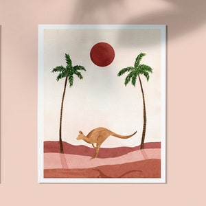 Puede incluir: Dos ilustraciones de acuarela de animales australianos. La primera muestra un koala trepando un &aacute;rbol con hojas verdes. La segunda muestra un canguro saltando a trav&eacute;s de un paisaje des&eacute;rtico con palmeras y un sol rojo.