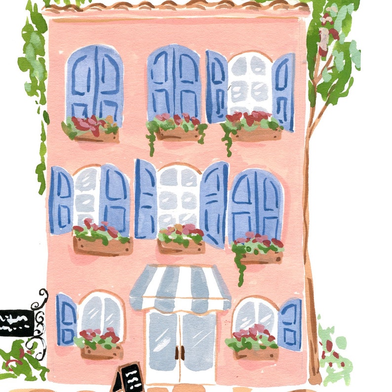 May include: A pink building with blue shutters and a striped awning. The building has three floors and each floor has two windows with flower boxes. The building is painted in a light pink color and the shutters are a bright blue. The awning is white and blue striped. The building is set against a white background.