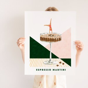 May include: A digital illustration of an espresso martini cocktail with a woman doing a handstand in the drink. The background is a geometric pattern of pink, green, and yellow.
