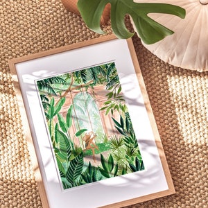May include: A framed illustration of a woman sitting on a swing in a lush, green jungle. The woman is wearing a straw hat and a white dress. The jungle is filled with large, leafy plants and trees. The illustration is done in a watercolor style.