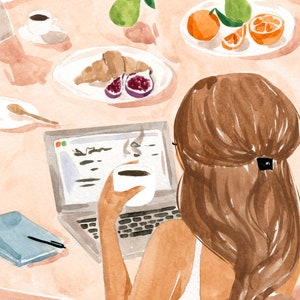May include: A woman sits at a table with a laptop, a cup of coffee, and a notebook. She has long brown hair and is wearing a white tank top. The table is covered in a light pink tablecloth and there are various items on the table, including a plate of fruit, a plate of pastries, and a cup of coffee.