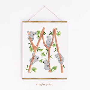 May include: A watercolor illustration of five koalas climbing on tree branches. The koalas are gray and the branches are brown. The background is white.