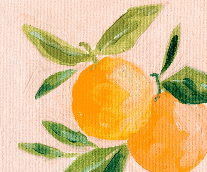 May include: Two bright orange oranges with green leaves on a light pink background. The oranges are painted in a loose, impressionistic style.
