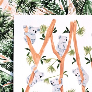 May include: A white background with a repeating pattern of orange branches and green leaves.  Five gray koalas are climbing the branches.