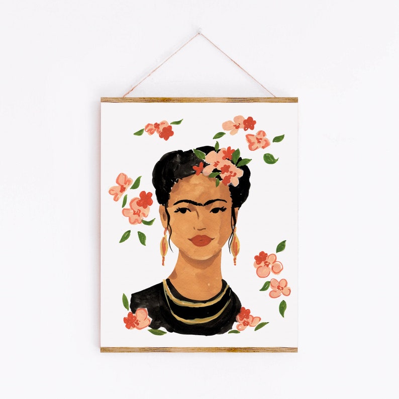 May include: A digital illustration of a woman with dark hair and a flower crown. She is wearing a black top and has a dark eyebrow and a small mustache. The background is white with pink flowers.