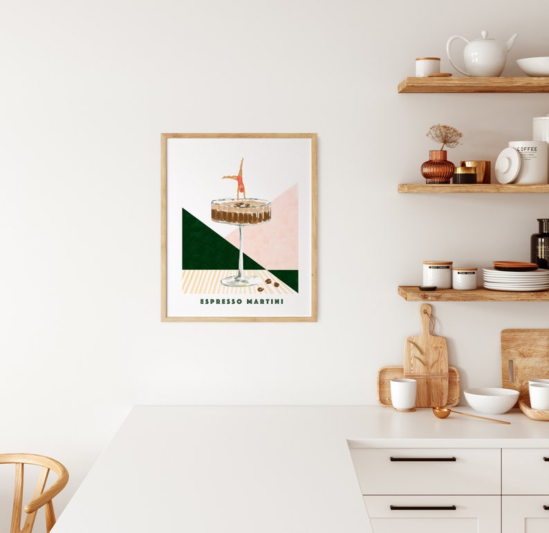 May include: A digital illustration of an espresso martini cocktail with a woman doing a handstand in the drink. The background is a green and pink geometric design with the text "Espresso Martini" at the bottom.