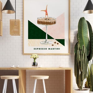 May include: A minimalist poster with a geometric design featuring a martini glass filled with coffee and a woman doing a handstand on top of the glass. The text "Espresso Martini" is printed below the glass.