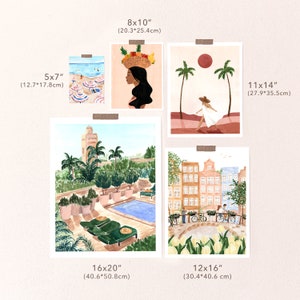 May include: Five watercolor illustrations of different scenes, each with a white border and a size label in inches and centimeters. The illustrations include a beach scene with umbrellas, a woman with a basket of fruit on her head, a woman walking on a beach with palm trees, a courtyard with a pool and palm trees, and a city scene with buildings and a bridge.