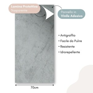 May include: A rectangular adhesive vinyl panel with a gray stone-like texture, featuring a transparent protective layer being peeled back. The panel measures 70cm in width and includes text labels indicating it is scratch-resistant, easy to clean, durable, and water-repellent.