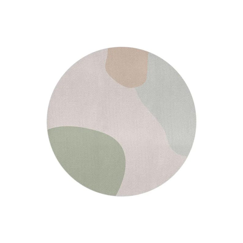 May include: A round rug with a soft, abstract design. The rug features a light gray base with organic shapes in muted green, beige, and light blue. The rug is a decorative floor covering.